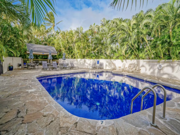 Luxury Poipu Kauai Vacation Rental  Ocean View Top-Floor Condo Near Brennecke’s Beach